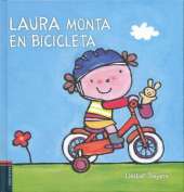 Laura monta en bicicleta