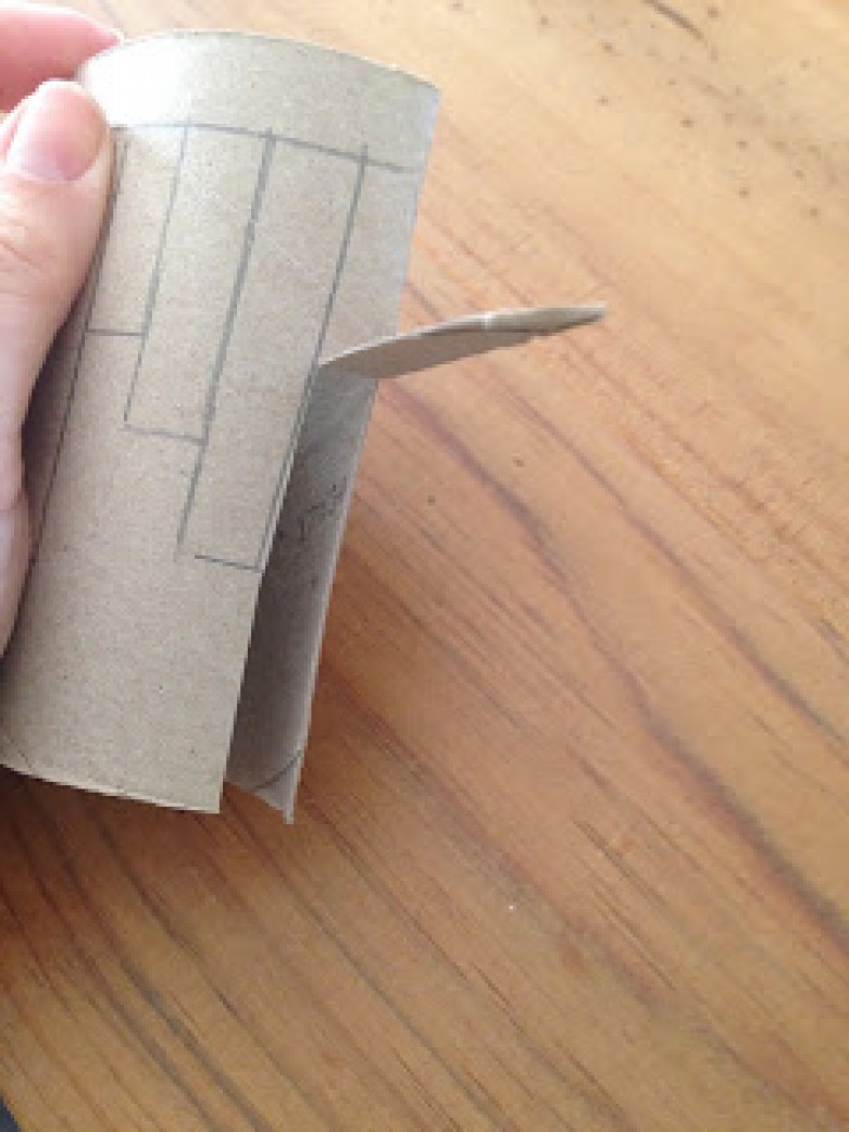 Cut out the first building and bend back